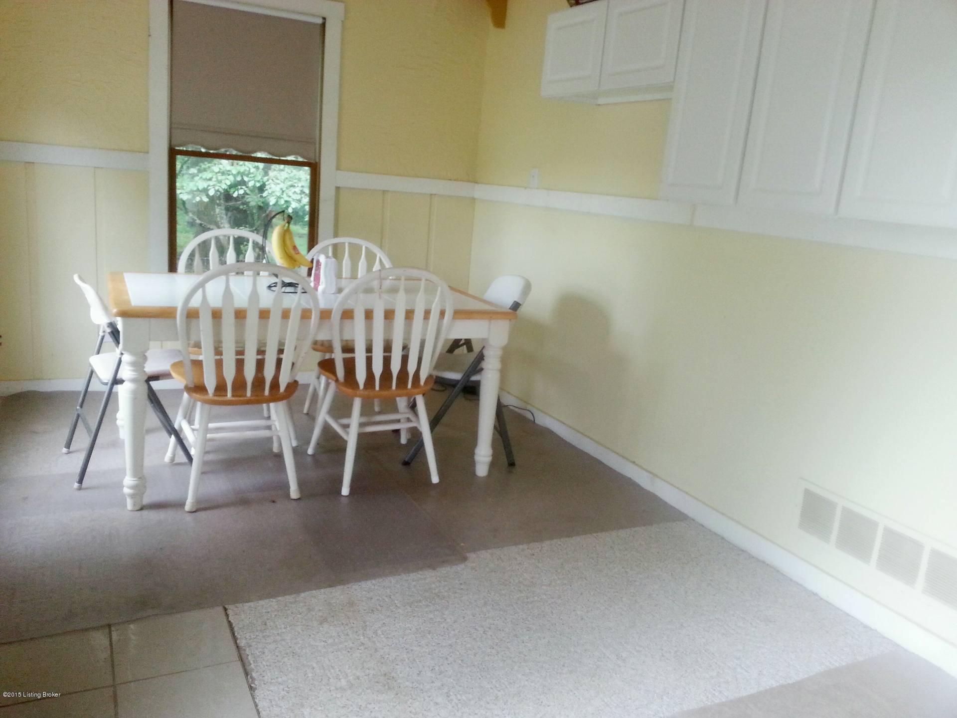 1905 Hunters Trace Road La Grange, KY 40031 - Photo 11 of 15 Dinning room and room just off the back porch.