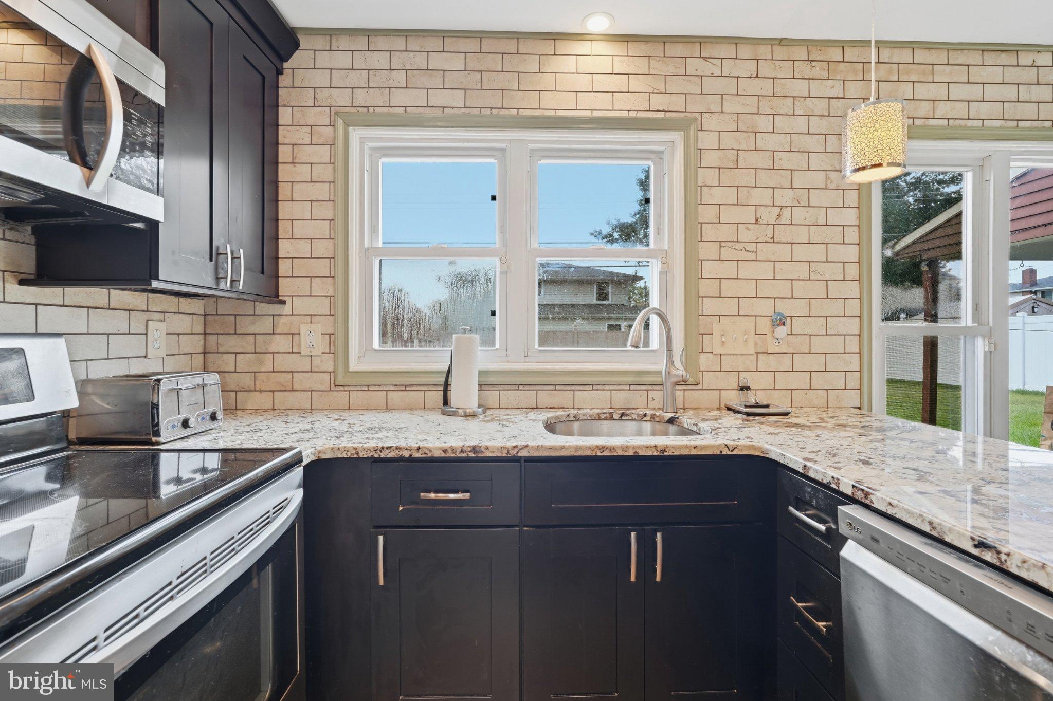 94 Terrace Road Levittown, PA 19056 - Photo 20 of 70 Modern kitchen with stylish finishes.