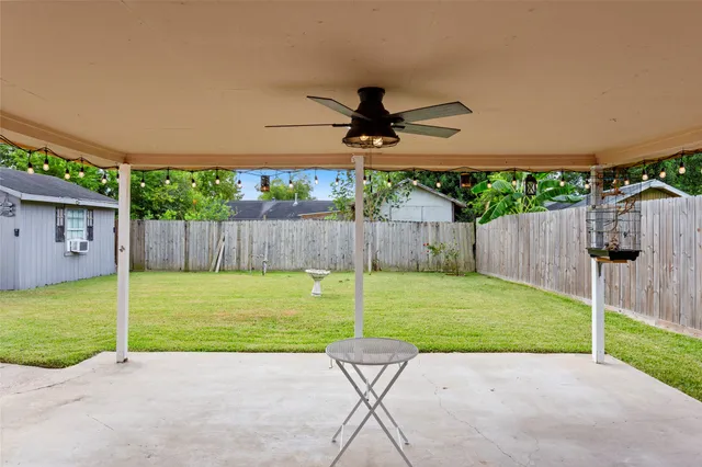 a view of a backyard with a slide