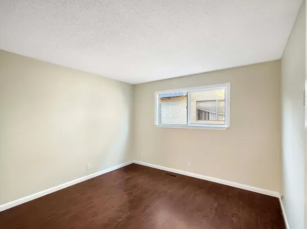 an empty room with a workspace