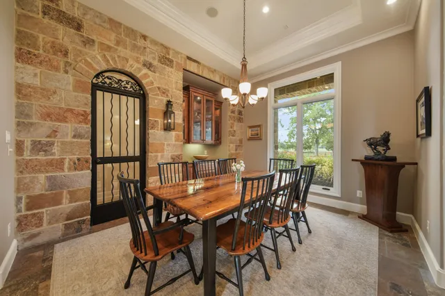 a large spacious bathroom with a large tub shower and sink