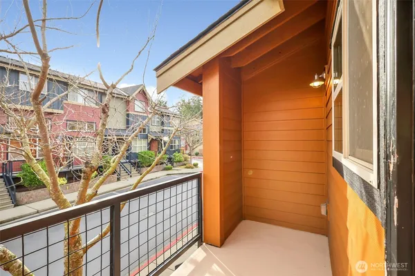 a view of balcony with a glass door