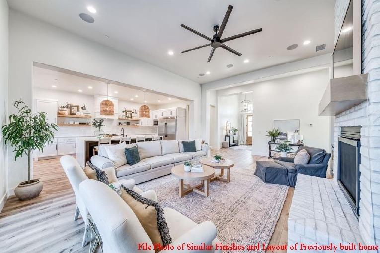 14480 Academy Oaks Lane Clovis, CA 93619 - Photo 15 of 37 a living room with fireplace furniture and a large window