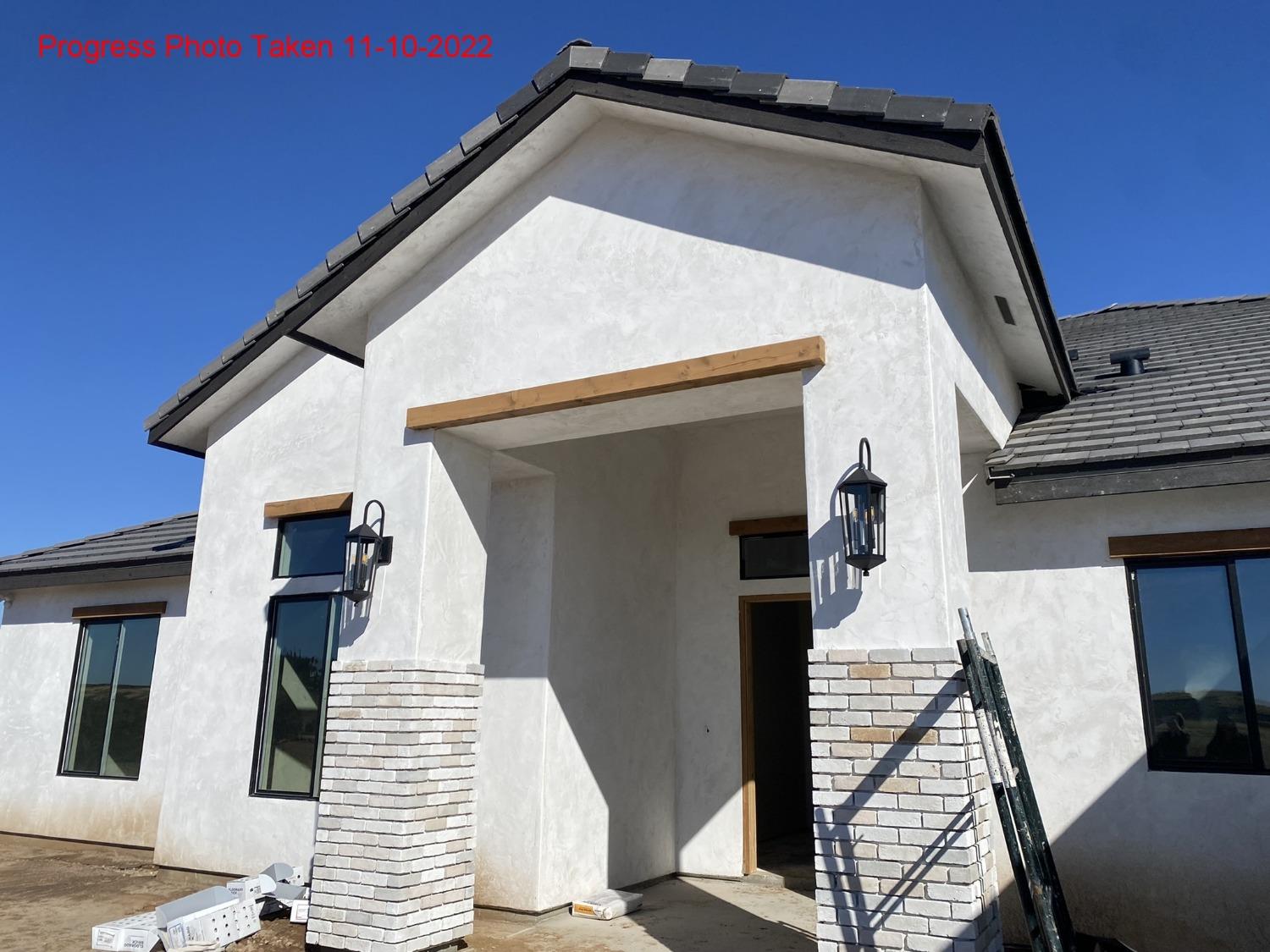 14480 Academy Oaks Lane Clovis, CA 93619 - Photo 2 of 37 a view of house with wooden stairs and stairs