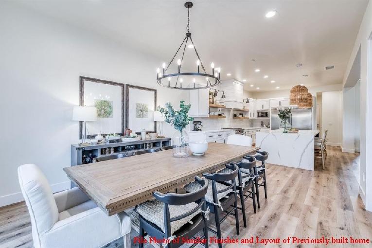 14480 Academy Oaks Lane Clovis, CA 93619 - Photo 28 of 37 a view of a dining room with furniture window and wooden floor