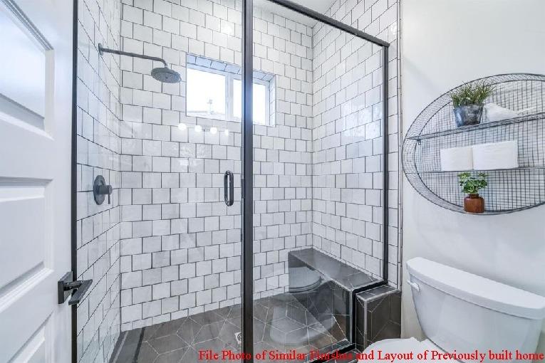 14480 Academy Oaks Lane Clovis, CA 93619 - Photo 31 of 37 a bathroom with a toilet and a shower