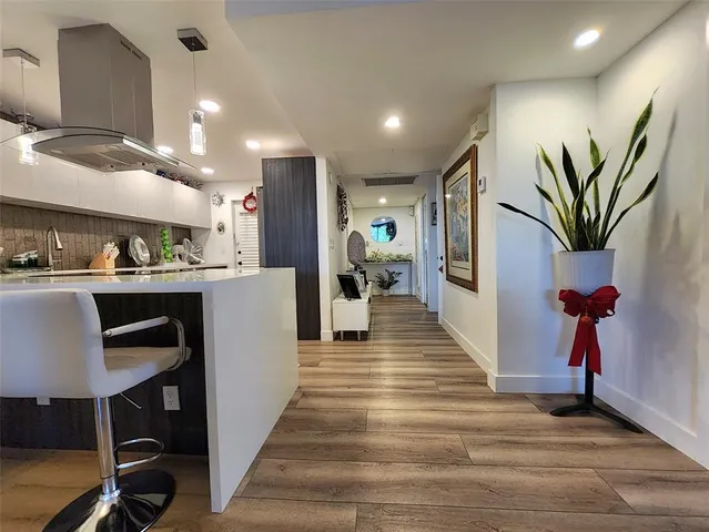 a dining room with furniture and a livingroom