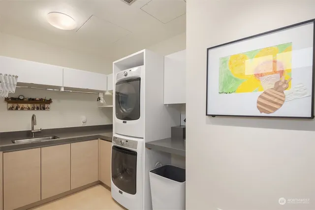 a utility room with cabinets