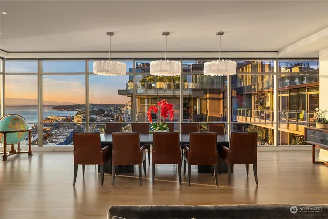 a view of a dining room with furniture window and outside view