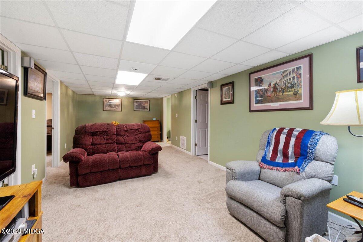 151 Deer Ridge Trail Macon, GA 31210 - Photo 23 of 43 a living room with furniture and a couch