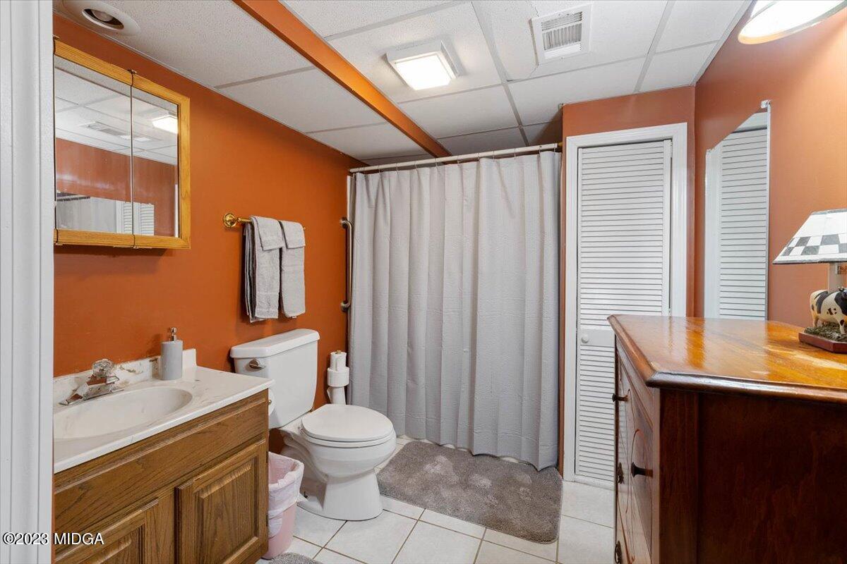 151 Deer Ridge Trail Macon, GA 31210 - Photo 28 of 43 a bathroom with a sink a toilet and shower