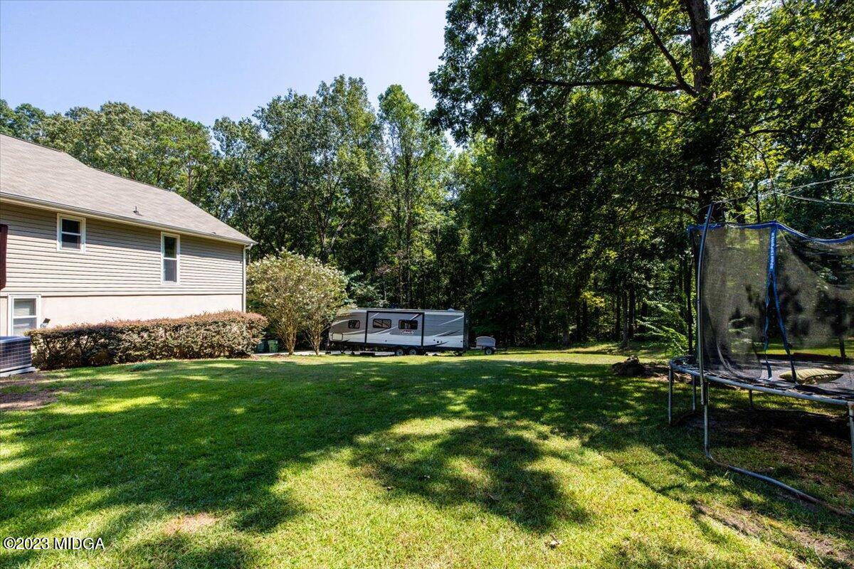 151 Deer Ridge Trail Macon, GA 31210 - Photo 36 of 43 a view of a house with backyard