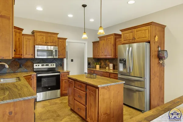 $450,000 | 4828 Northwest Kendall Drive, Topeka, KS 66618