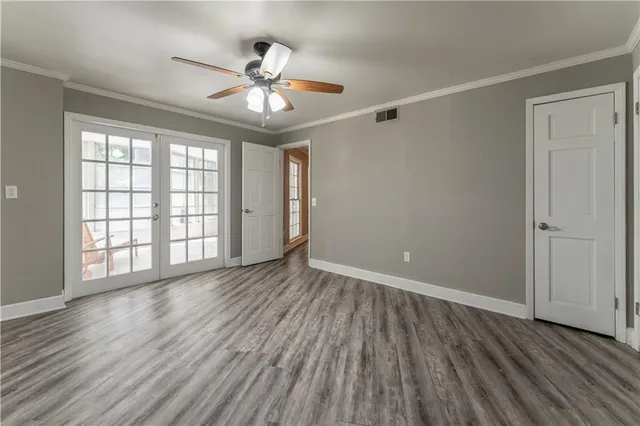 a view of a room with a large window