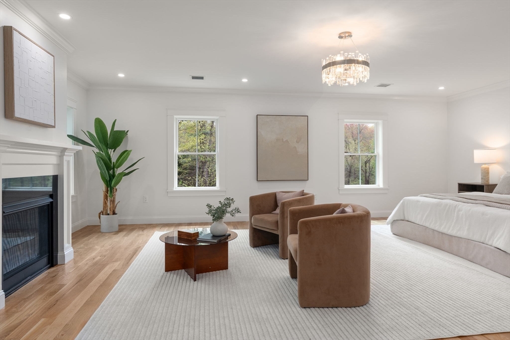 82 Deer Path Lane Weston, MA 02493 - Photo 18 of 42 a living room with furniture and a fireplace
