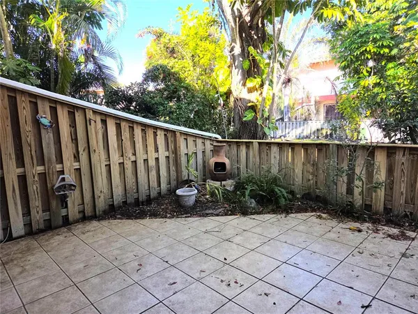a view of a backyard of the house