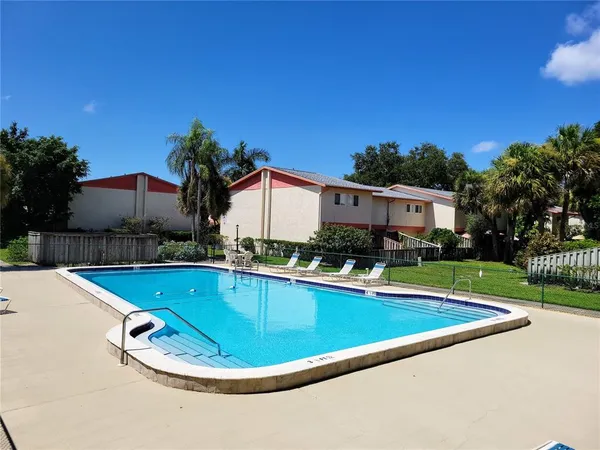a view of outdoor space yard swimming pool and a patio