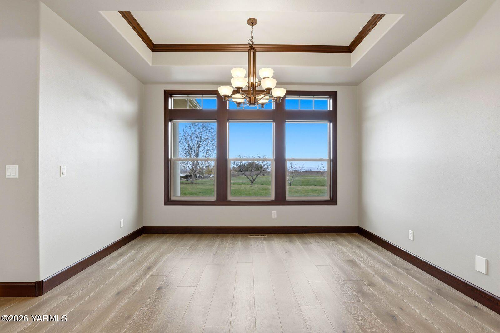 13507 West Church Road Yakima, WA 98903 - Photo 10 of 46 wooden floor in an empty room with a window