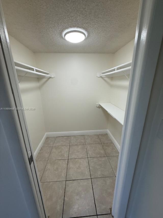 8075 Southwest 107th Avenue, Unit 305 Miami, FL 33173 - Photo 25 of 38 master walk in closet