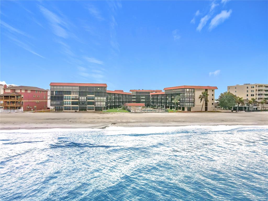 17580 Gulf Boulevard, Unit 219 Redington Shores, FL 33708 - Photo 42 of 47 a view of an ocean and a building