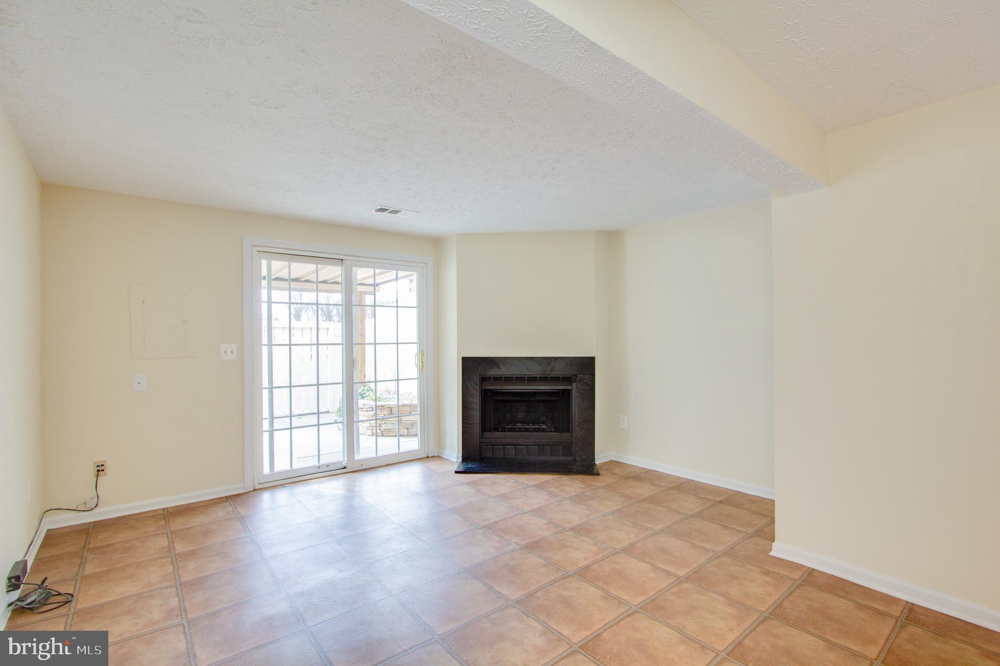 1957 Belmont Ridge Court Reston, VA 20191 - Photo 16 of 21 Large family room with tile floor