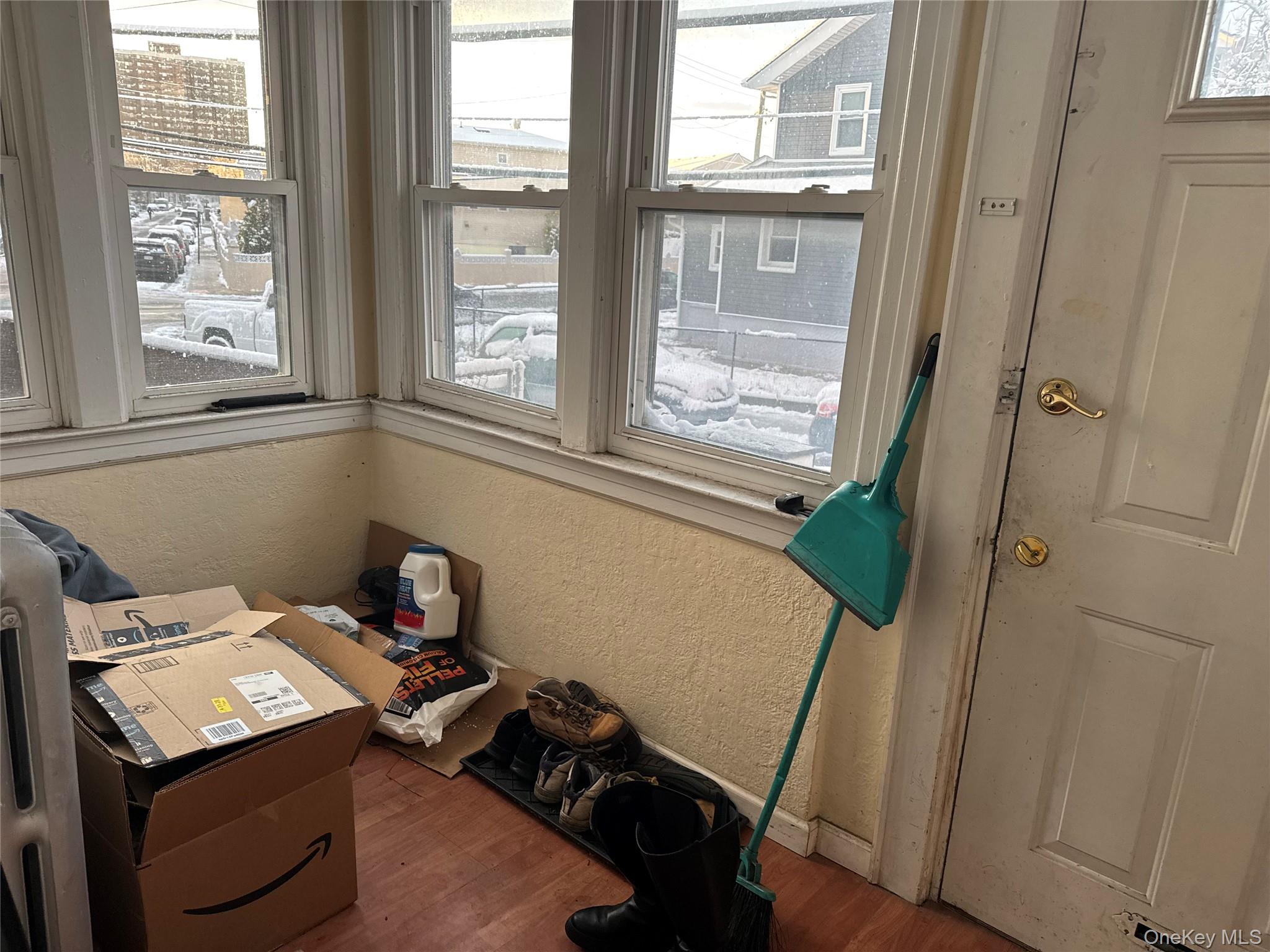 24-31 Deerfield Road Queens, NY 11691 - Photo 7 of 25 View of sunroom