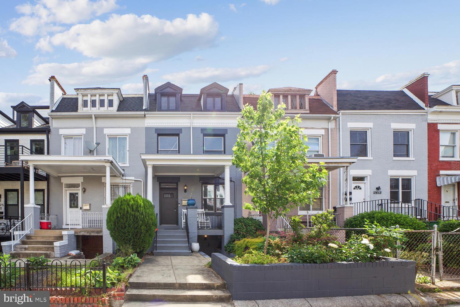 3617 13th Street Northwest Washington, DC 20010 - Photo 1 of 23 front view of a brick house with a yard