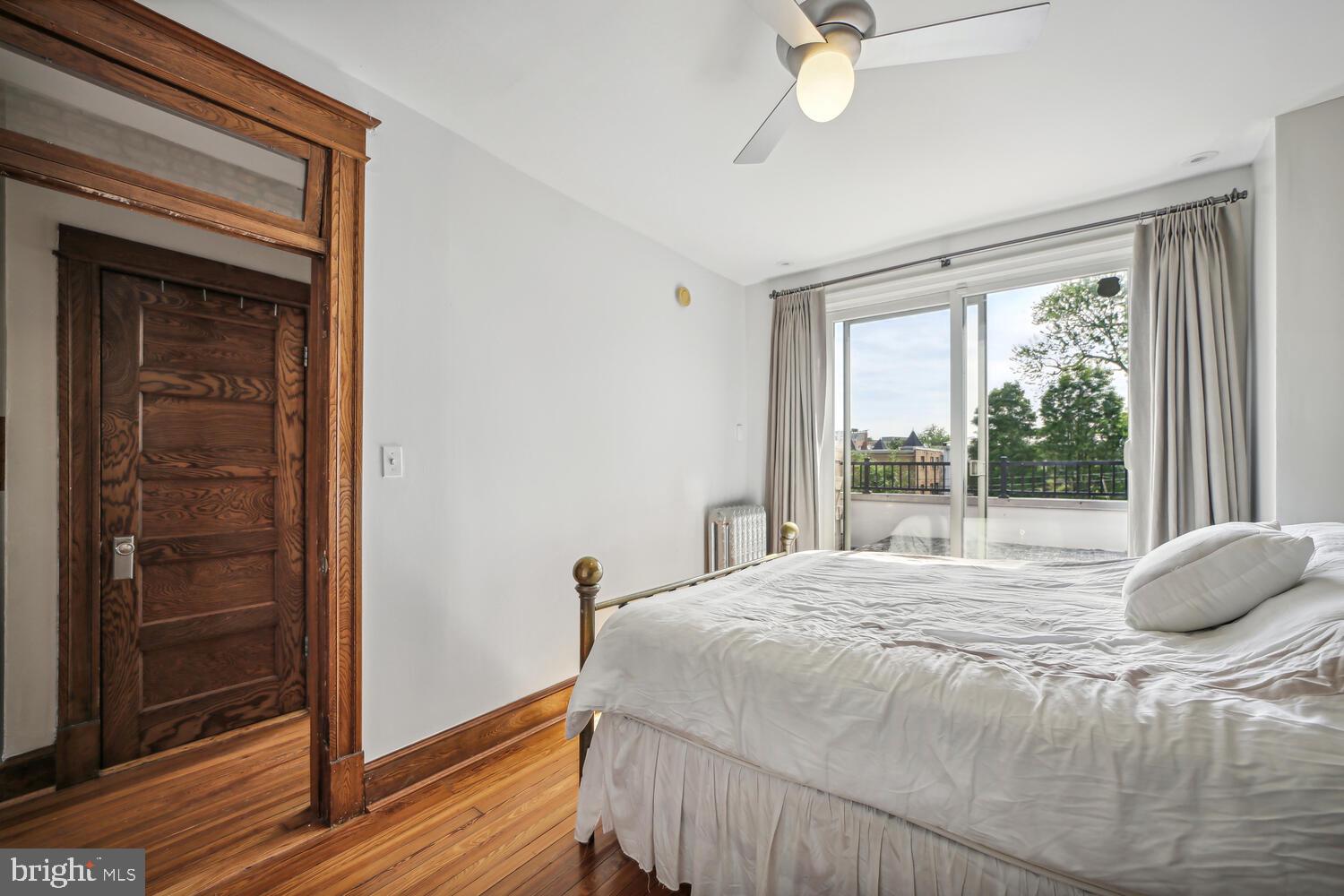 3617 13th Street Northwest Washington, DC 20010 - Photo 14 of 23 a bedroom with a bed and a window
