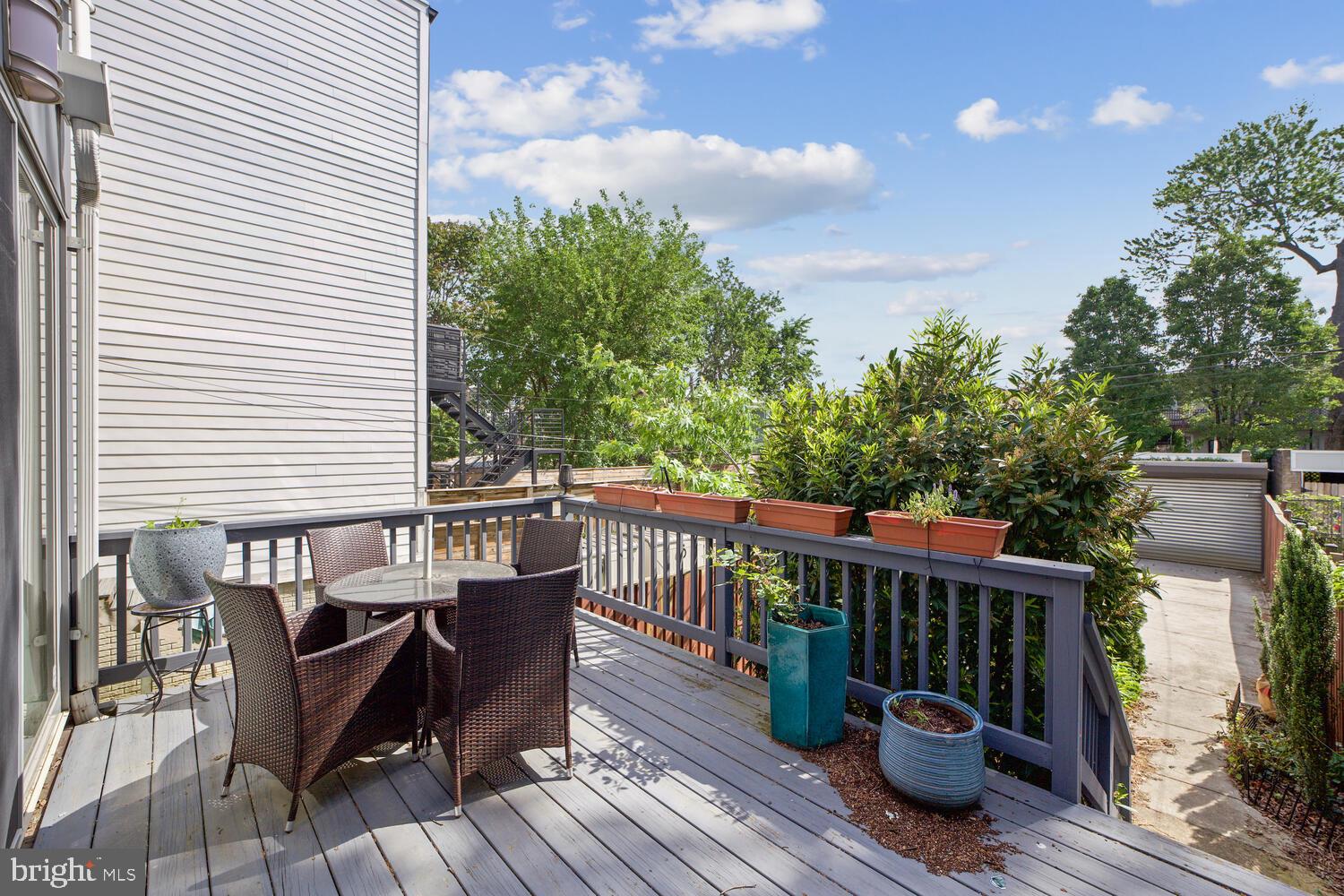 3617 13th Street Northwest Washington, DC 20010 - Photo 21 of 23 a view of a deck with furniture and a backyard