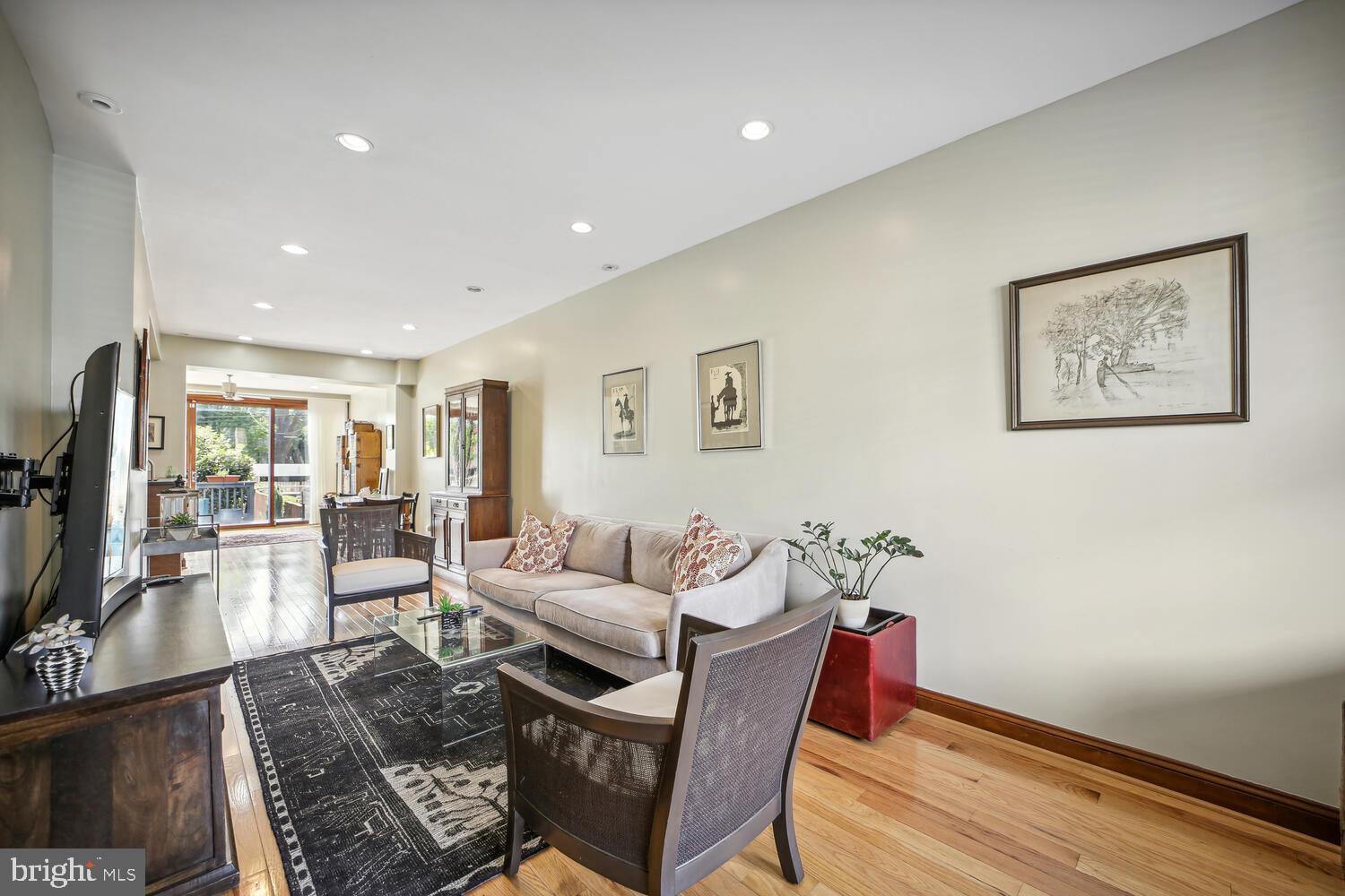 3617 13th Street Northwest Washington, DC 20010 - Photo 4 of 23 a living room with furniture and a flat screen tv