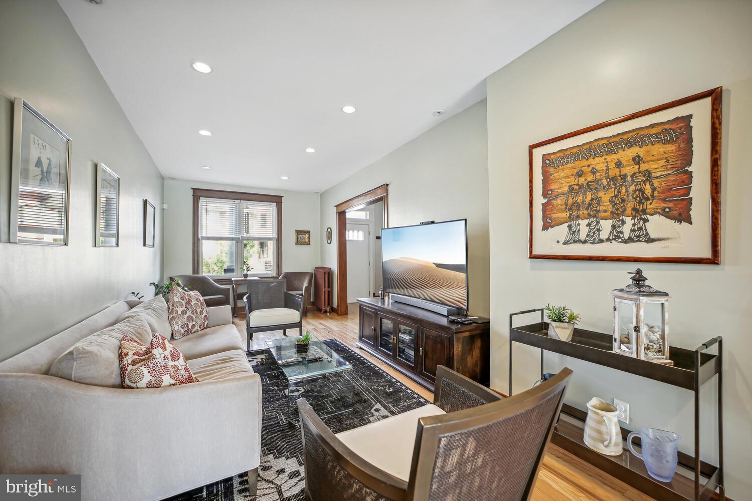 3617 13th Street Northwest Washington, DC 20010 - Photo 5 of 23 a living room with furniture and a flat screen tv