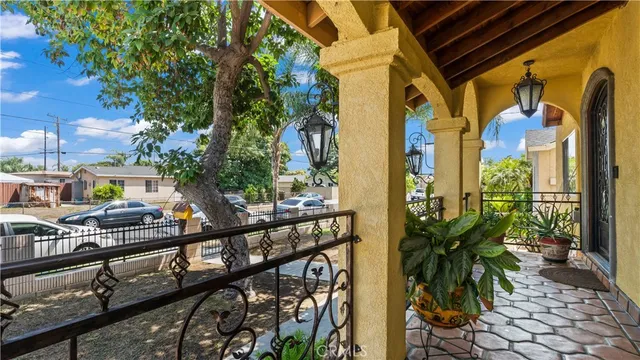 a view of a balcony with chairs
