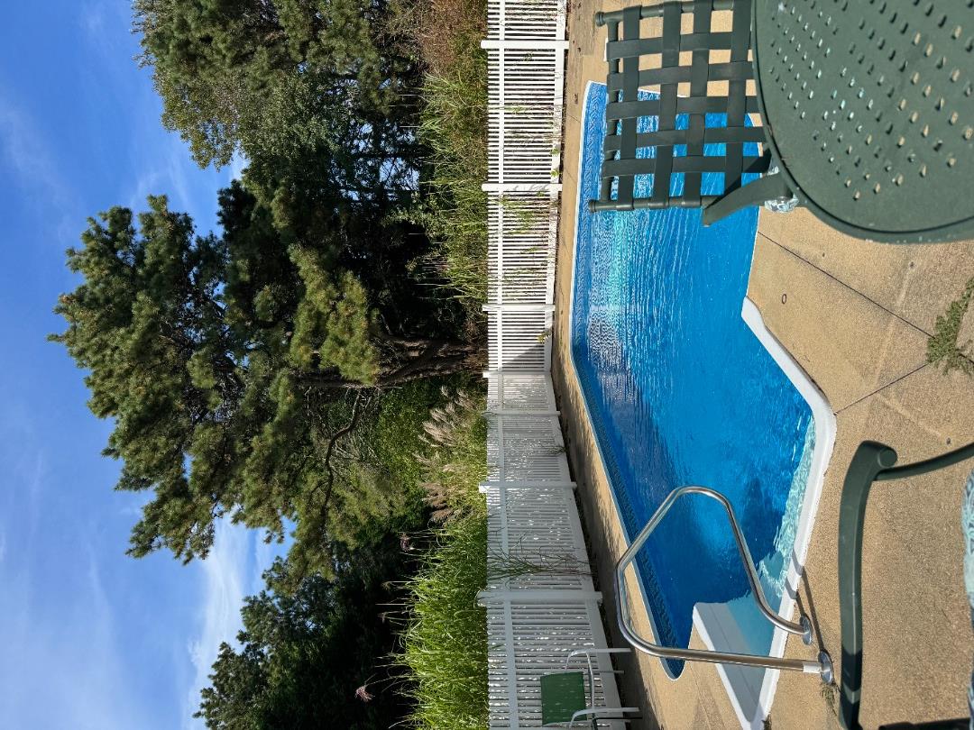 5 Seth's Path Oak Bluffs, MA 02557 - Photo 5 of 19 a view of a swimming pool with a lounge chairs