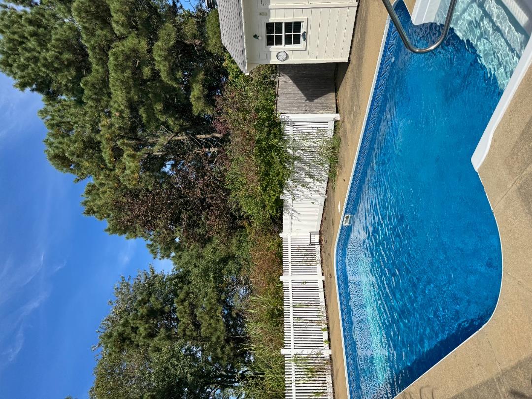 5 Seth's Path Oak Bluffs, MA 02557 - Photo 6 of 19 a view of swimming pool with an outdoor seating