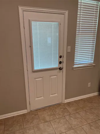 an empty room with window