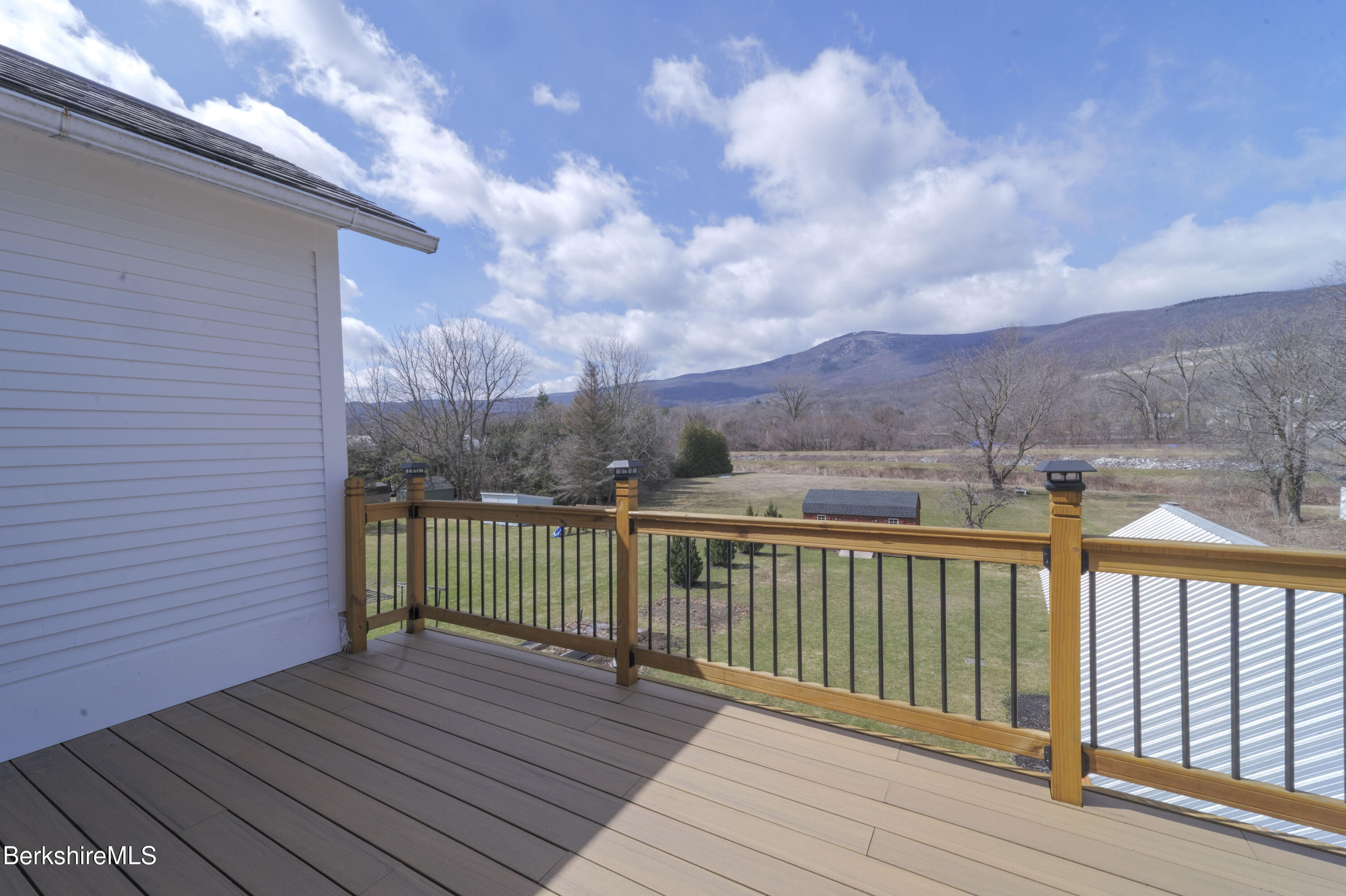 108 North Summer Street Adams, MA 01220 - Photo 14 of 28 a view of a balcony with wooden fence