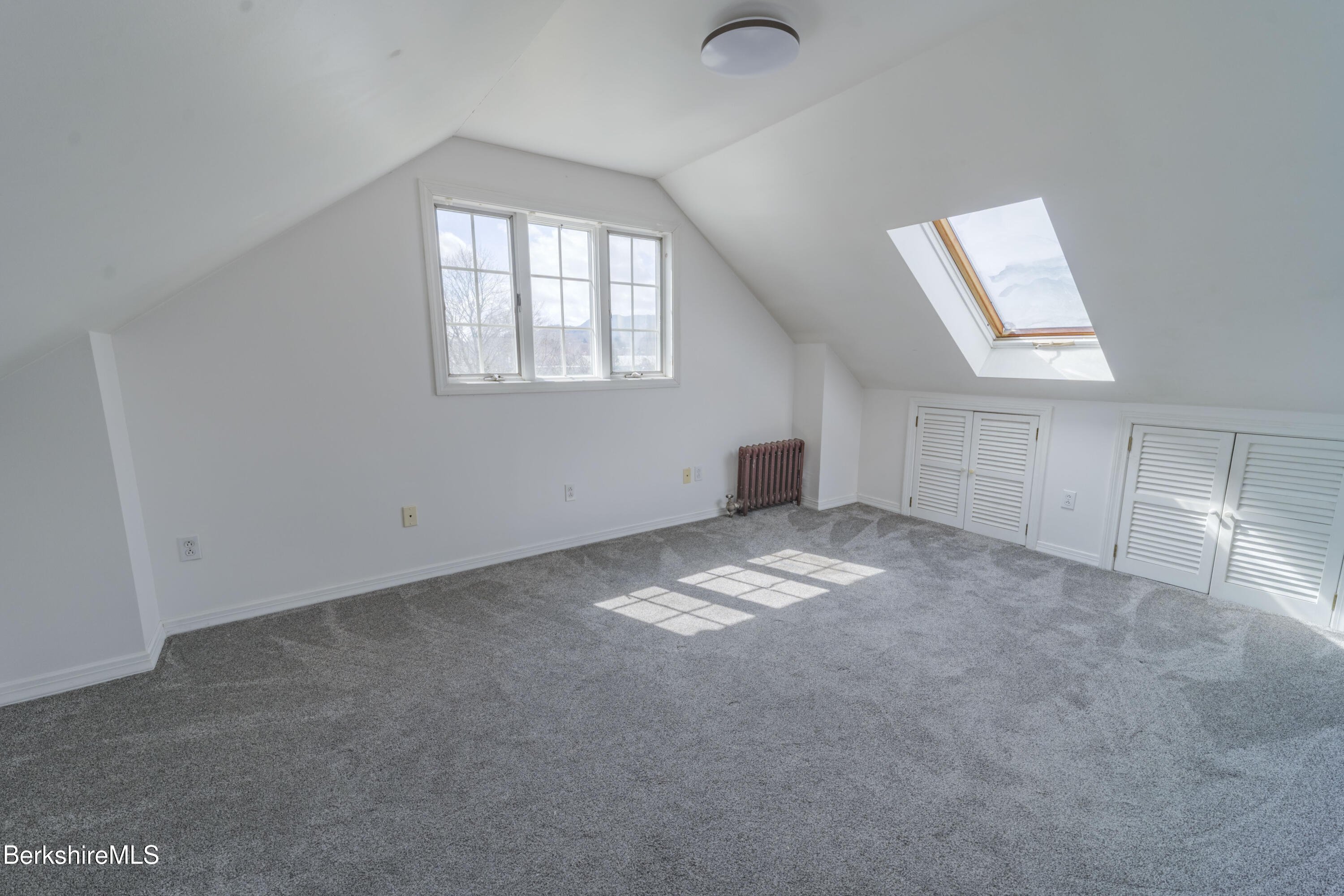 108 North Summer Street Adams, MA 01220 - Photo 17 of 28 an empty room with windows