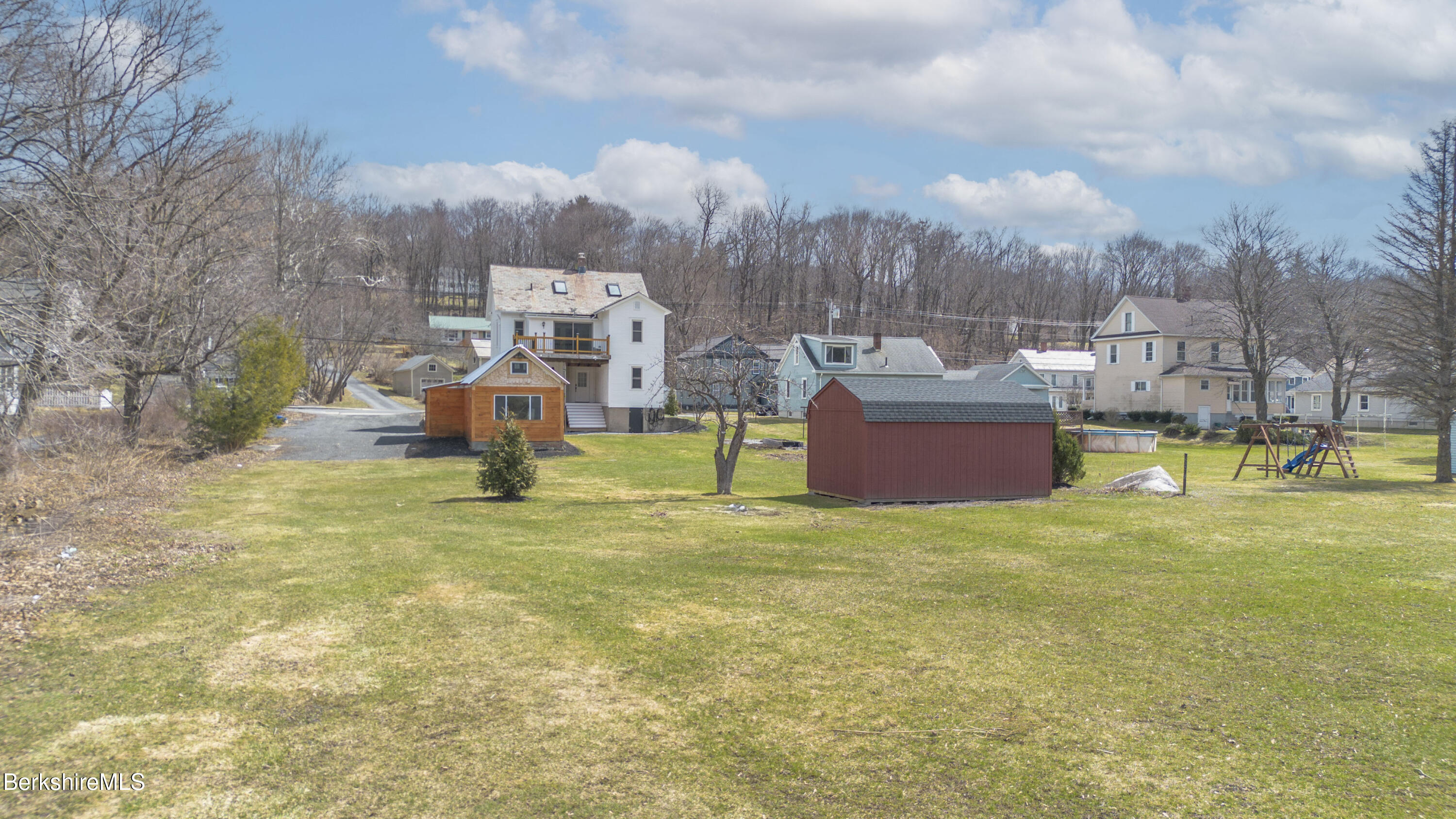 108 North Summer Street Adams, MA 01220 - Photo 19 of 28 a view of a house with a big yard and a large tree