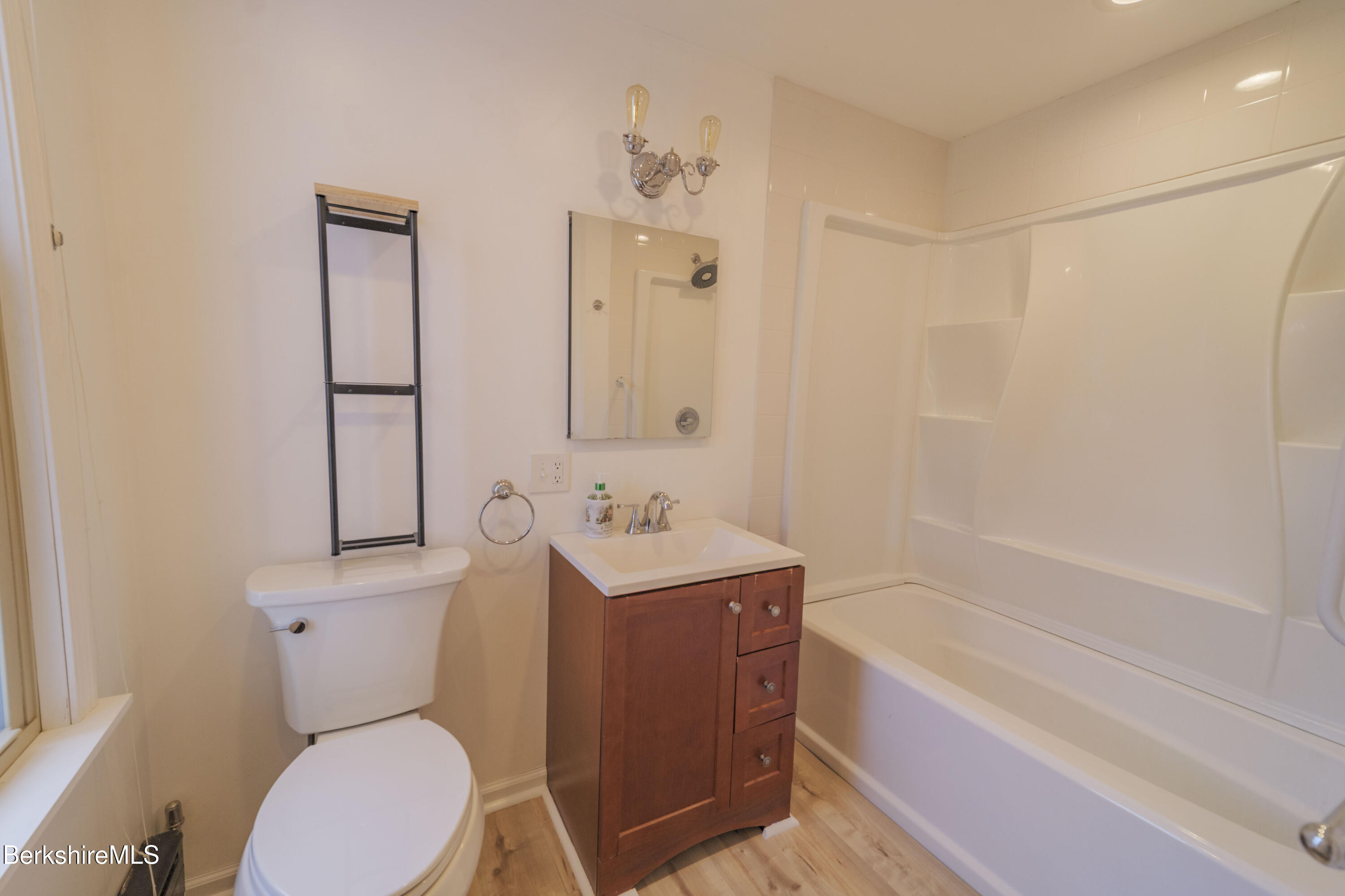 108 North Summer Street Adams, MA 01220 - Photo 5 of 28 a bathroom with a toilet a sink and bathtub