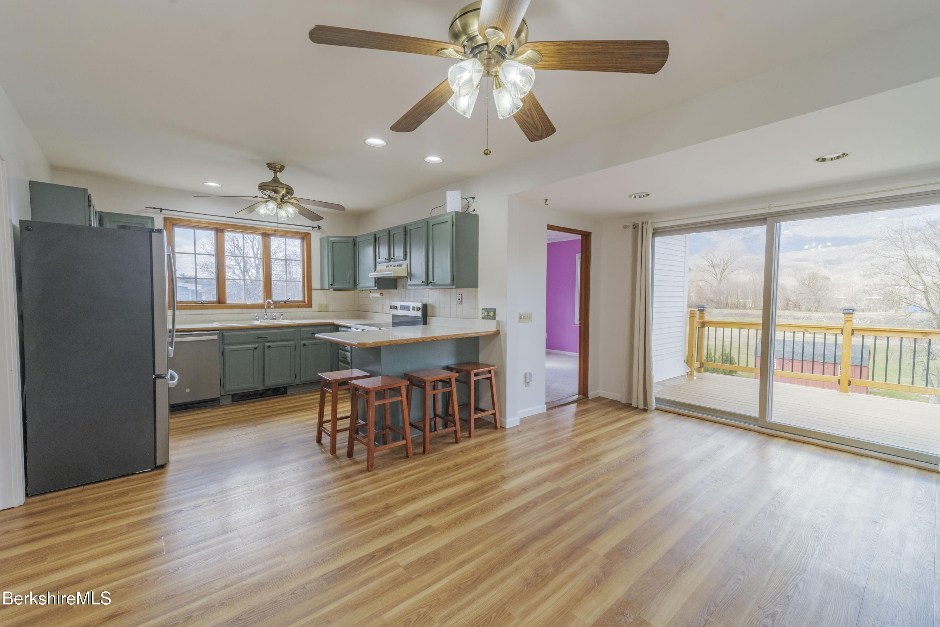 108 North Summer Street Adams, MA 01220 - Photo 9 of 28 a view of a kitchen and dining room