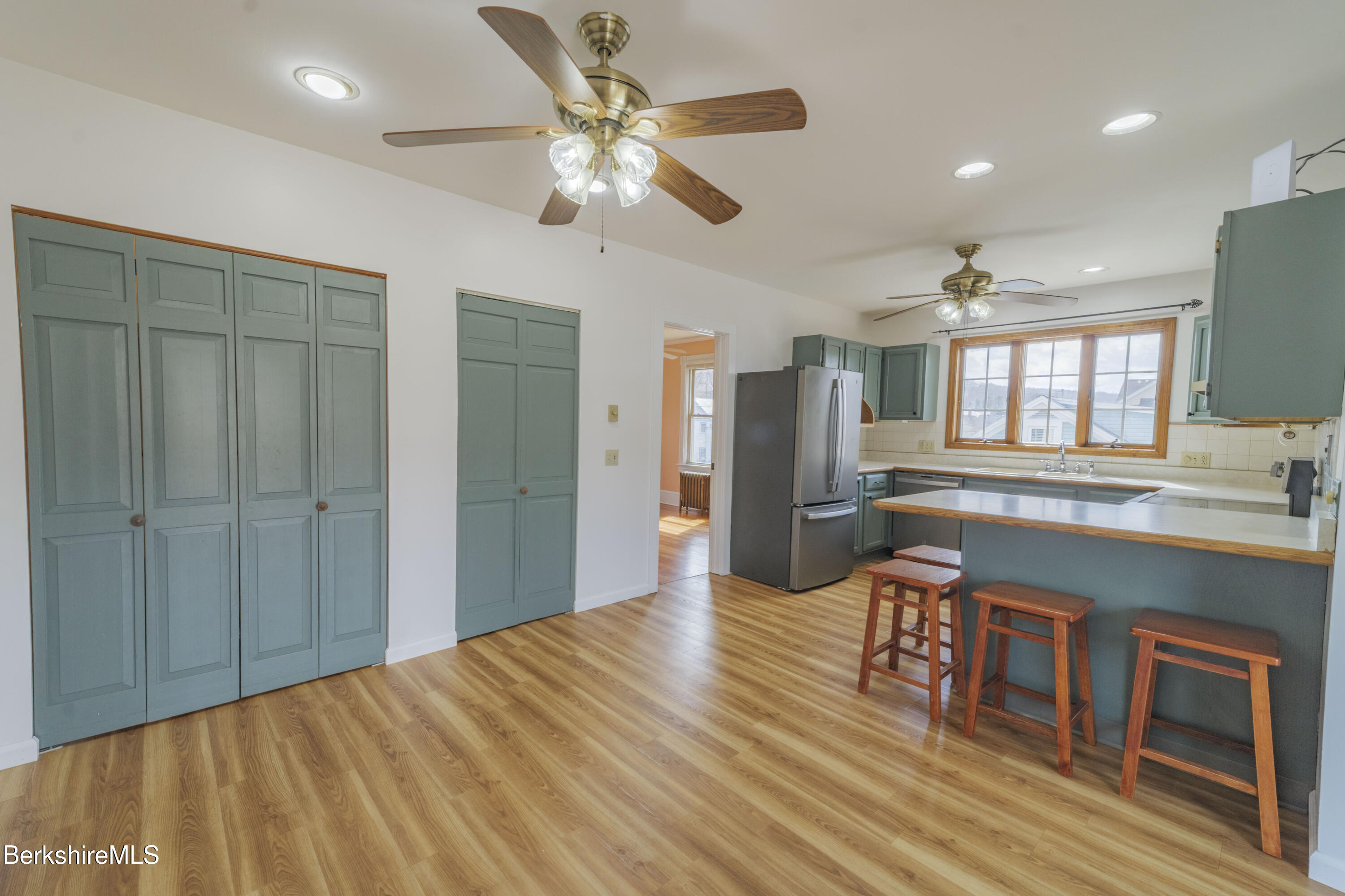 108 North Summer Street Adams, MA 01220 - Photo 10 of 28 a living room with stainless steel appliances kitchen island granite countertop furniture and a kitchen view