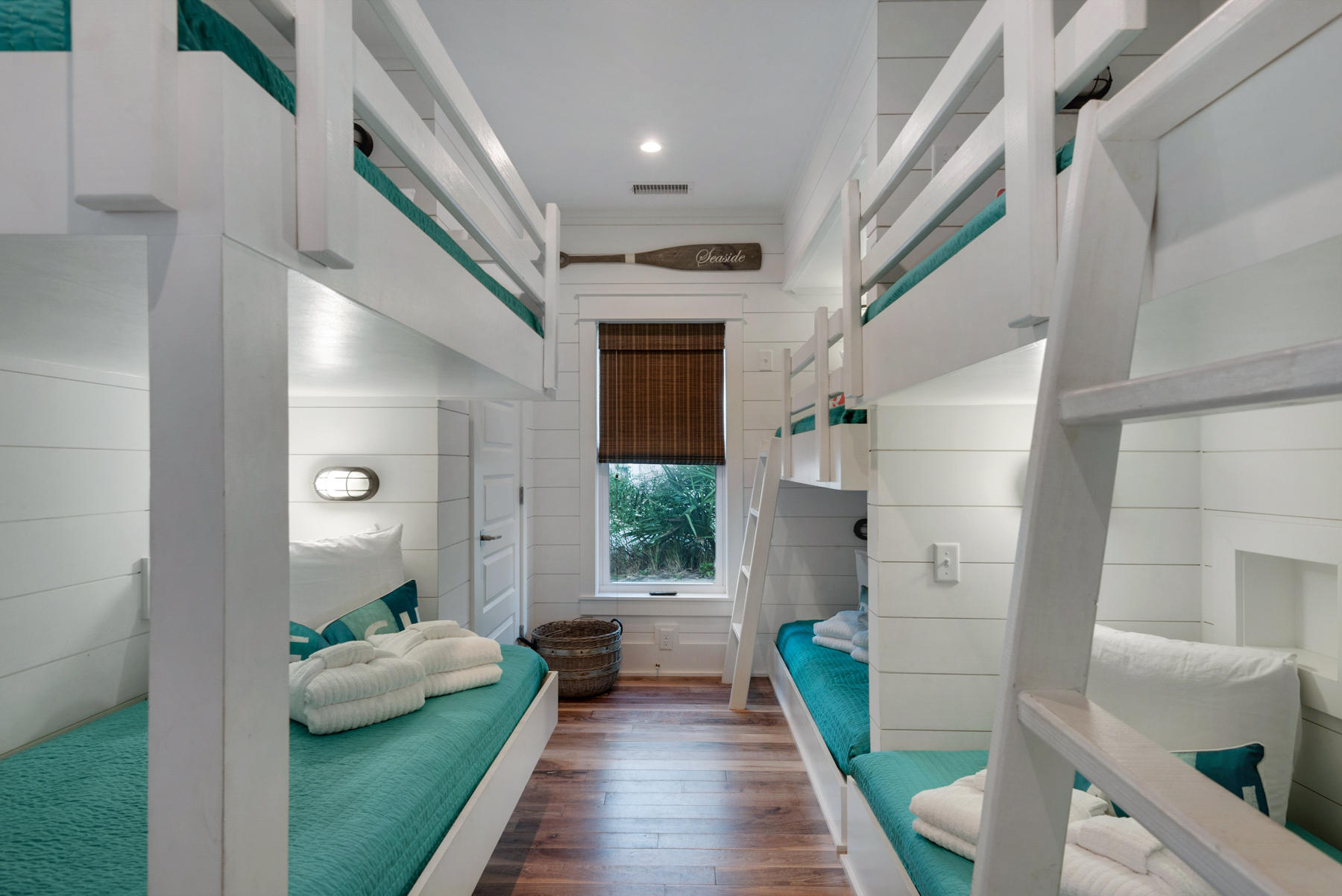 54 Chelsea Loop Road Santa Rosa Beach, FL 32459 - Photo 23 of 45 a hallway with wooden floor and windows