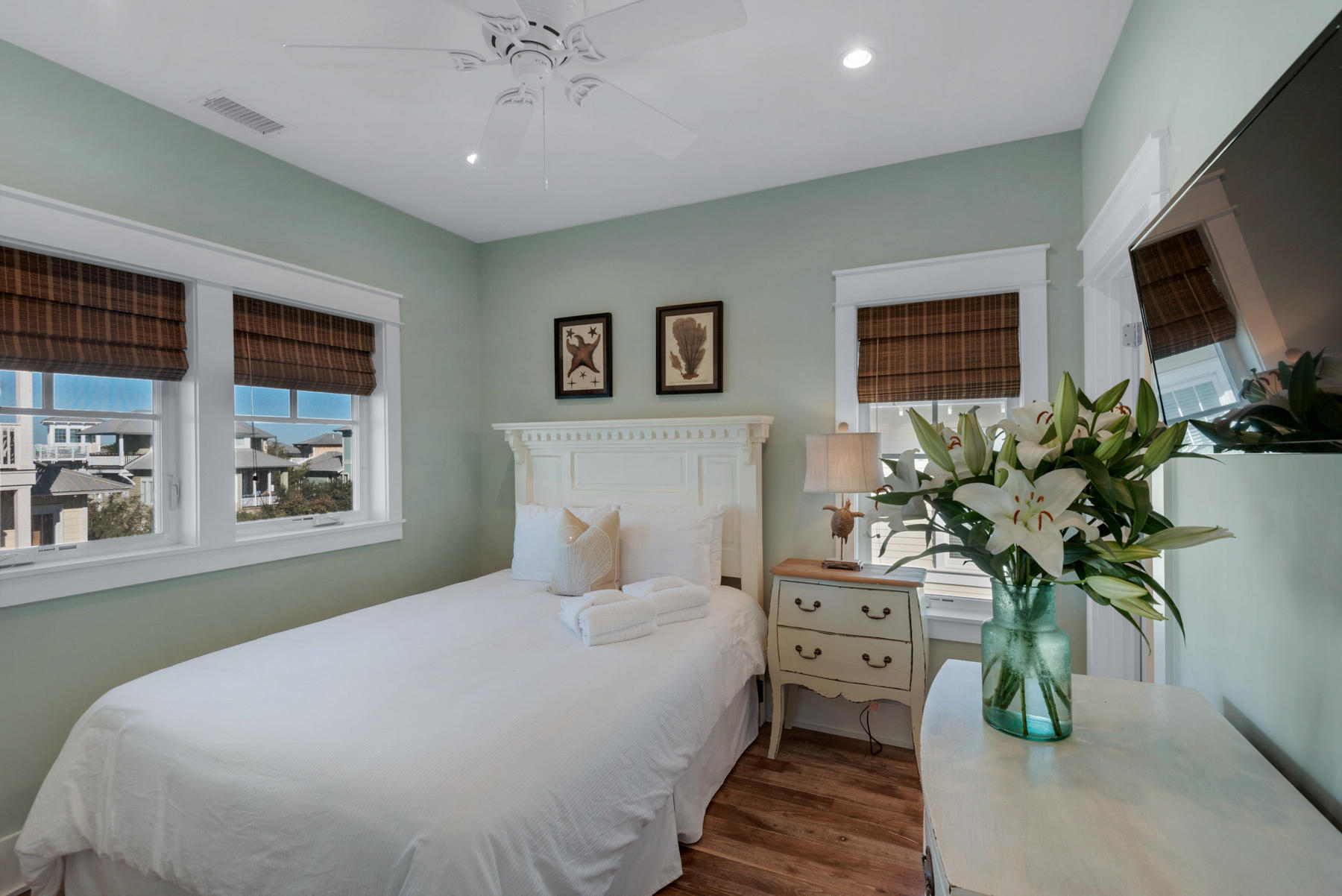 54 Chelsea Loop Road Santa Rosa Beach, FL 32459 - Photo 26 of 45 a bedroom with a balcony a bed and a potted plant