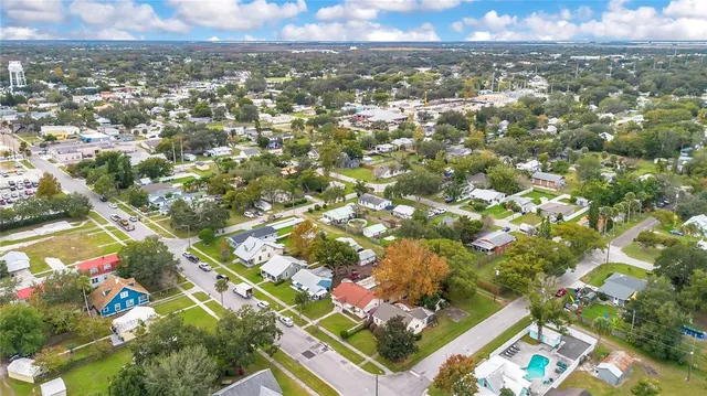 a aerial view of a house with a yard