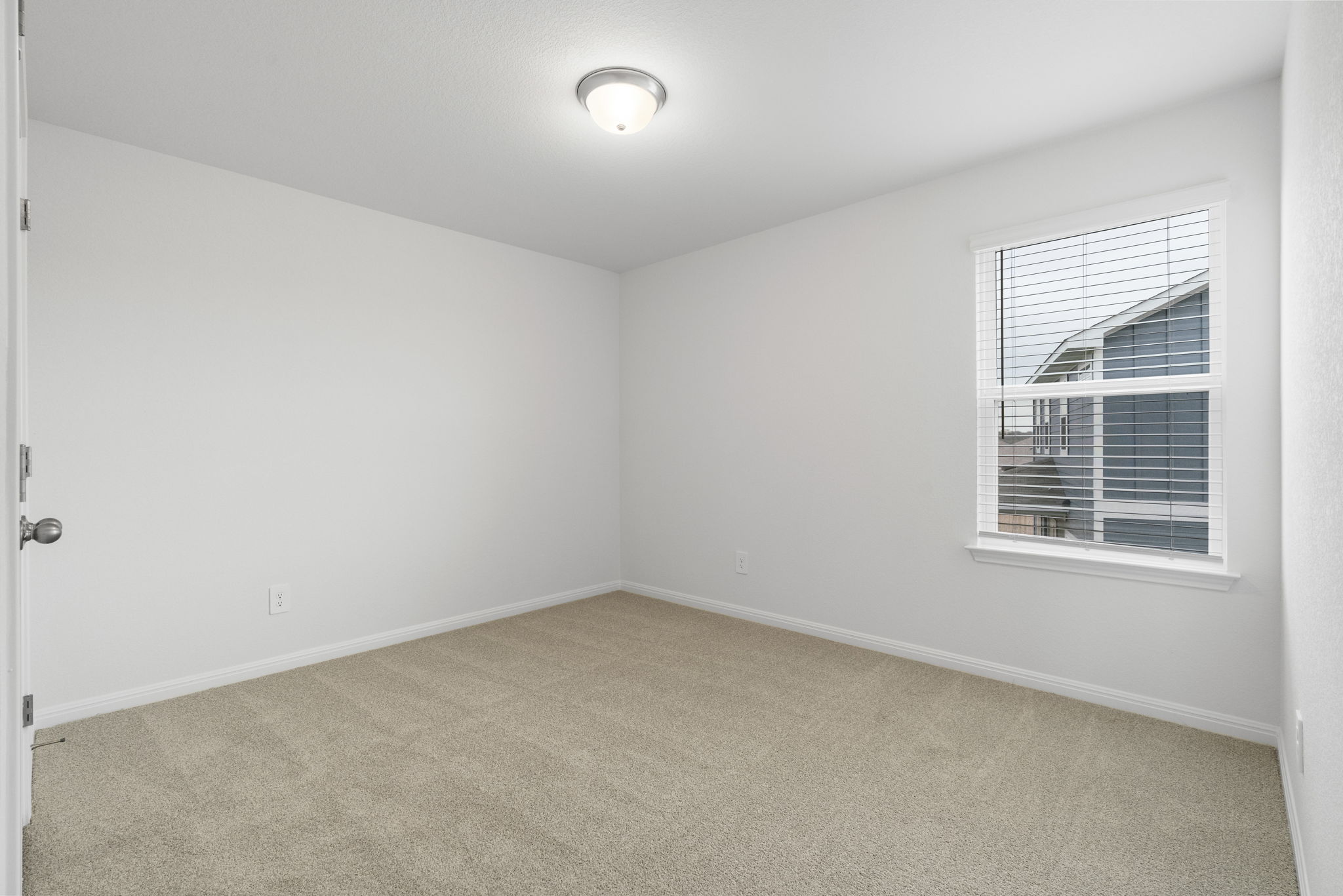 104 Boondoggle Ridge Cedar Creek, TX 78612 - Photo 30 of 33 an empty room with a window
