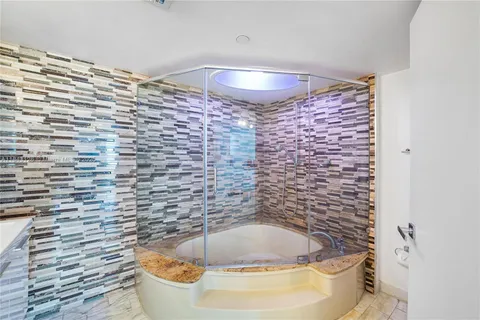 a bathroom with a sink and a bathtub