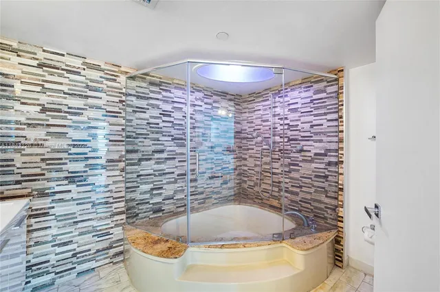 a bathroom with a sink and a bathtub