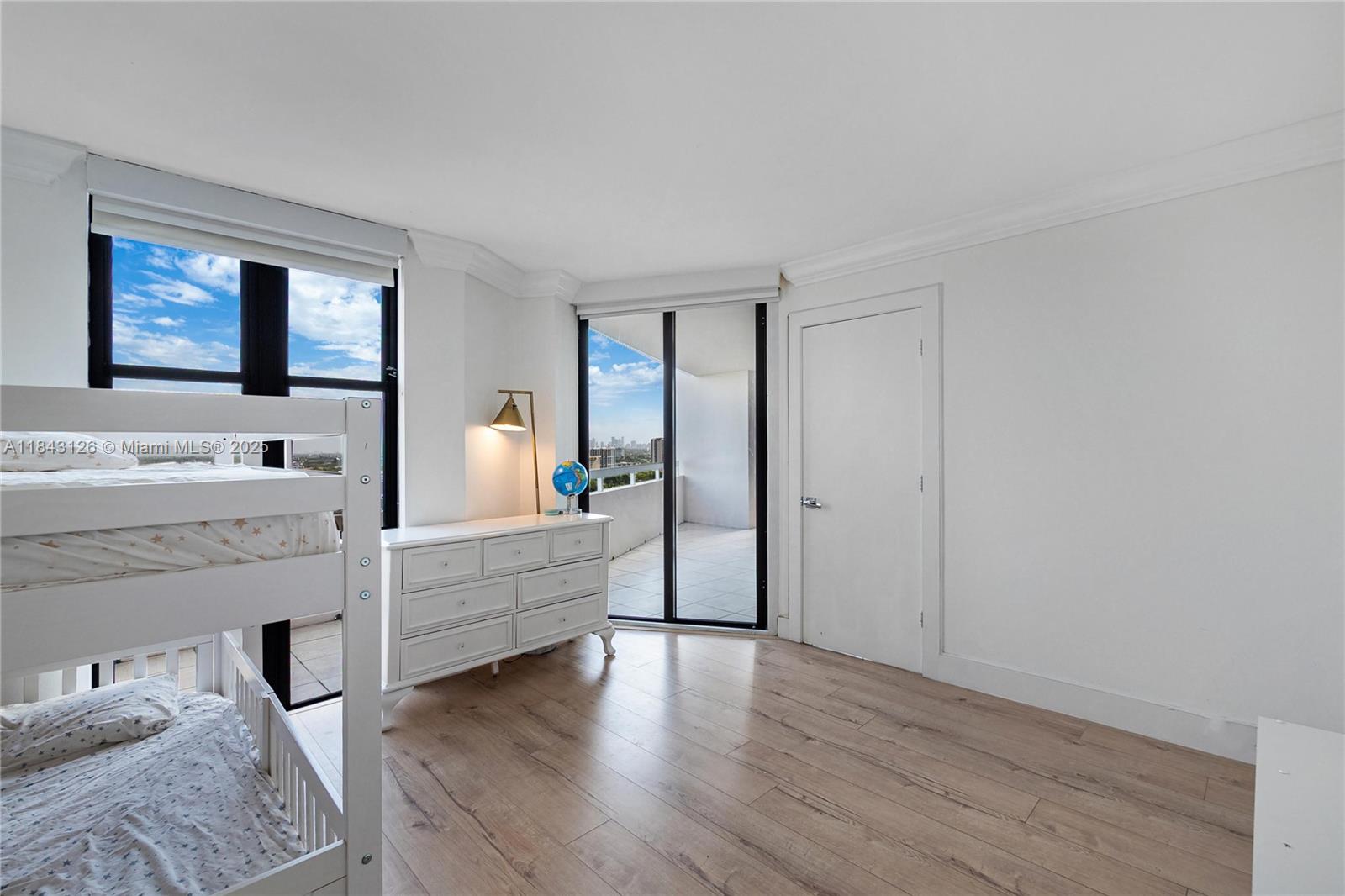 2000 Towerside Terrace, Unit PH9 Miami, FL 33138 - Photo 20 of 40 a view of living room with furniture and a window