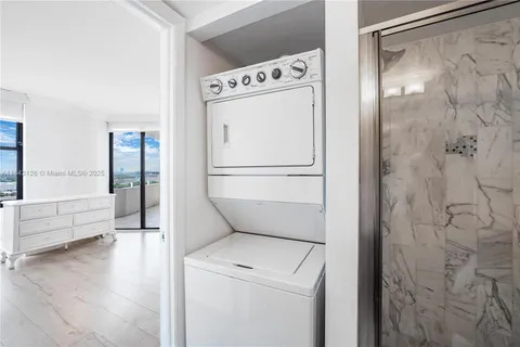 a utility room with dryer and washer
