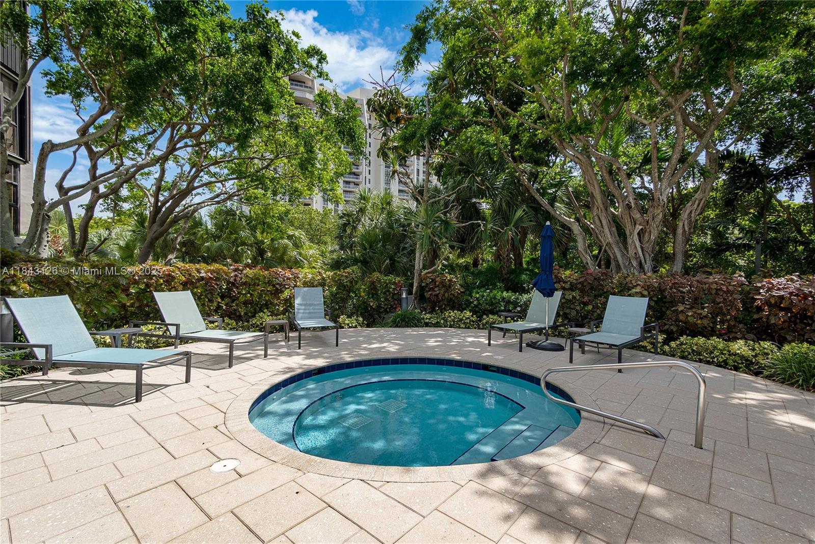 2000 Towerside Terrace, Unit PH9 Miami, FL 33138 - Photo 39 of 40 a view of swimming pool with lounge chair